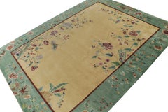 Rug & Kilim’s Chinese Deco Style Rug with Teal Border, Gold Field and Florals