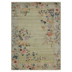 Rug & Kilim’s Chinese Style Art Deco rug in Green & Blue with Colorful Florals