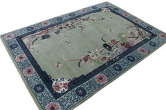 Rug & Kilim’s Chinese Style Art Deco Rug in Green with Blue Floral Patterns
