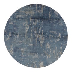 Rug & Kilim’s “City Light” Abstract Round Rug in Blue & Ivory