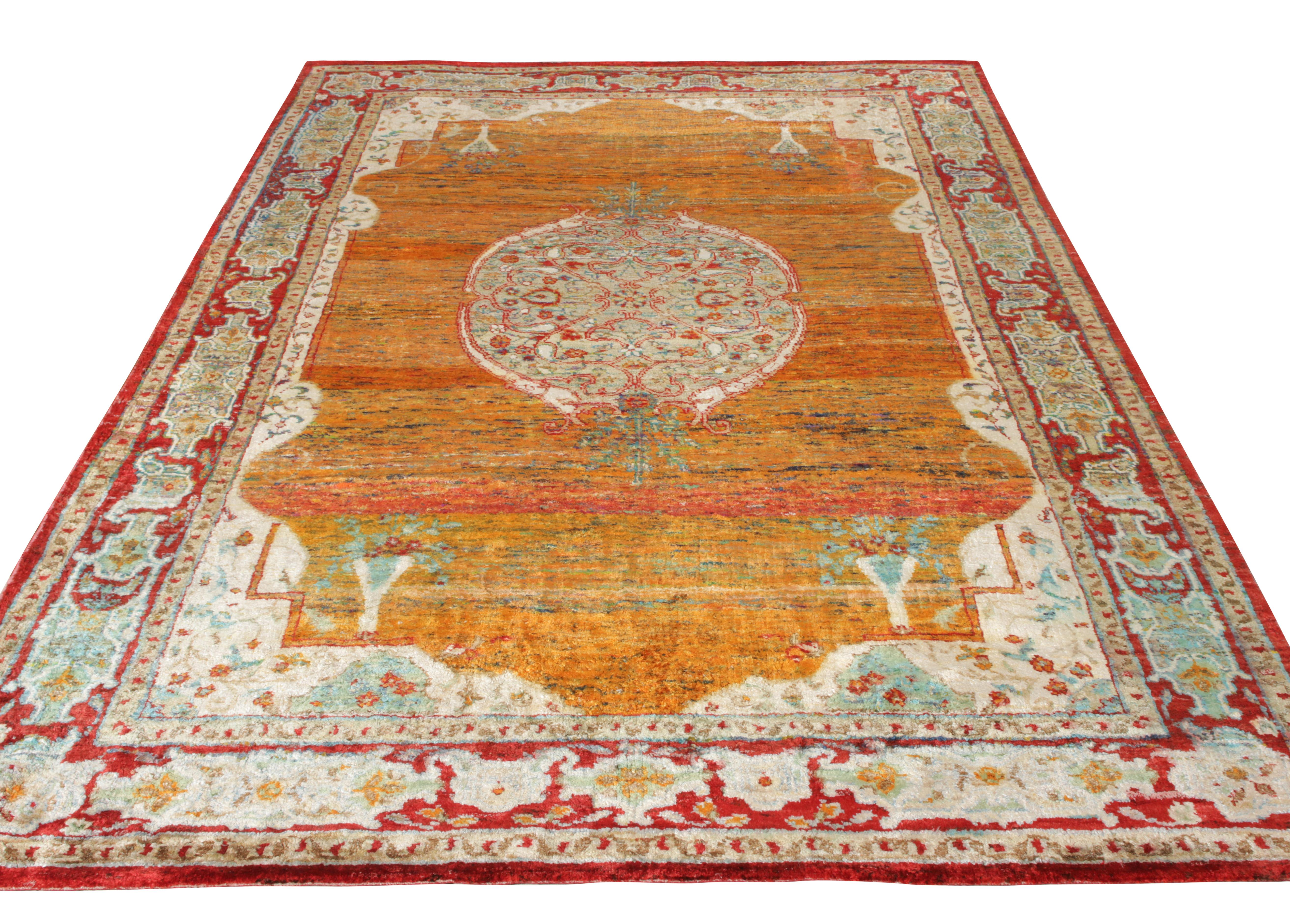Hand knotted in silk, Rug & Kilim makes a modern take on classic Agra style joining their Modern Classics Collection. A 6x9 scale witnessing the union of an impactful blue medallion pattern in lively red & orange tones all sitting harmoniously while