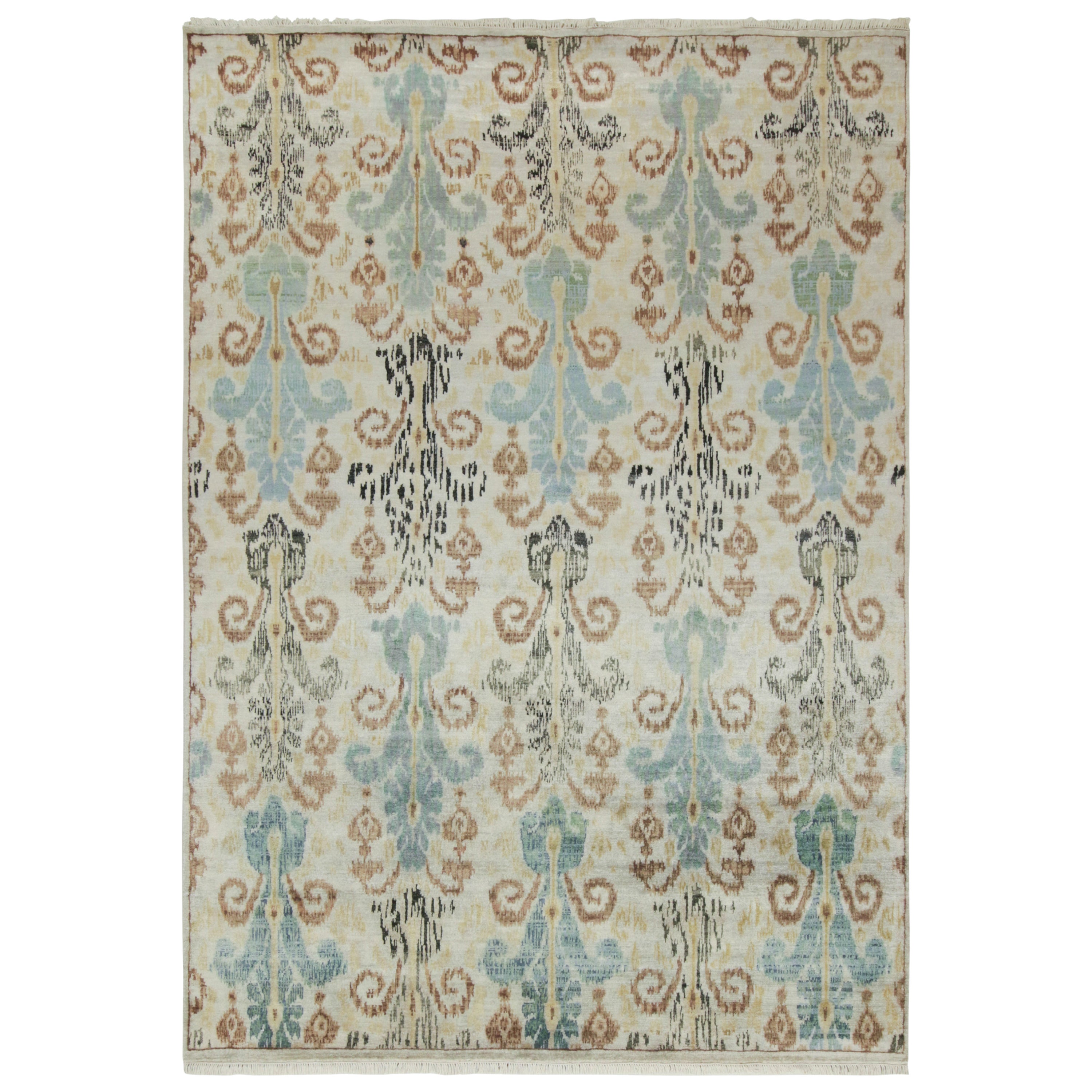 Alfombra de estilo ikats clásico de Rug & Kilim con motivos azules, beige, marrones y negros