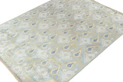 Rug & Kilim’s Classic Ikats Style Rug with Gold, White and Blue Patterns