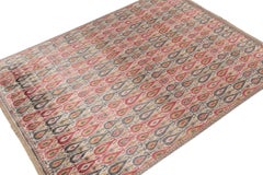 Rug & Kilim’s Classic Ikats Style Rug with Red, Gray and Gold Patterns
