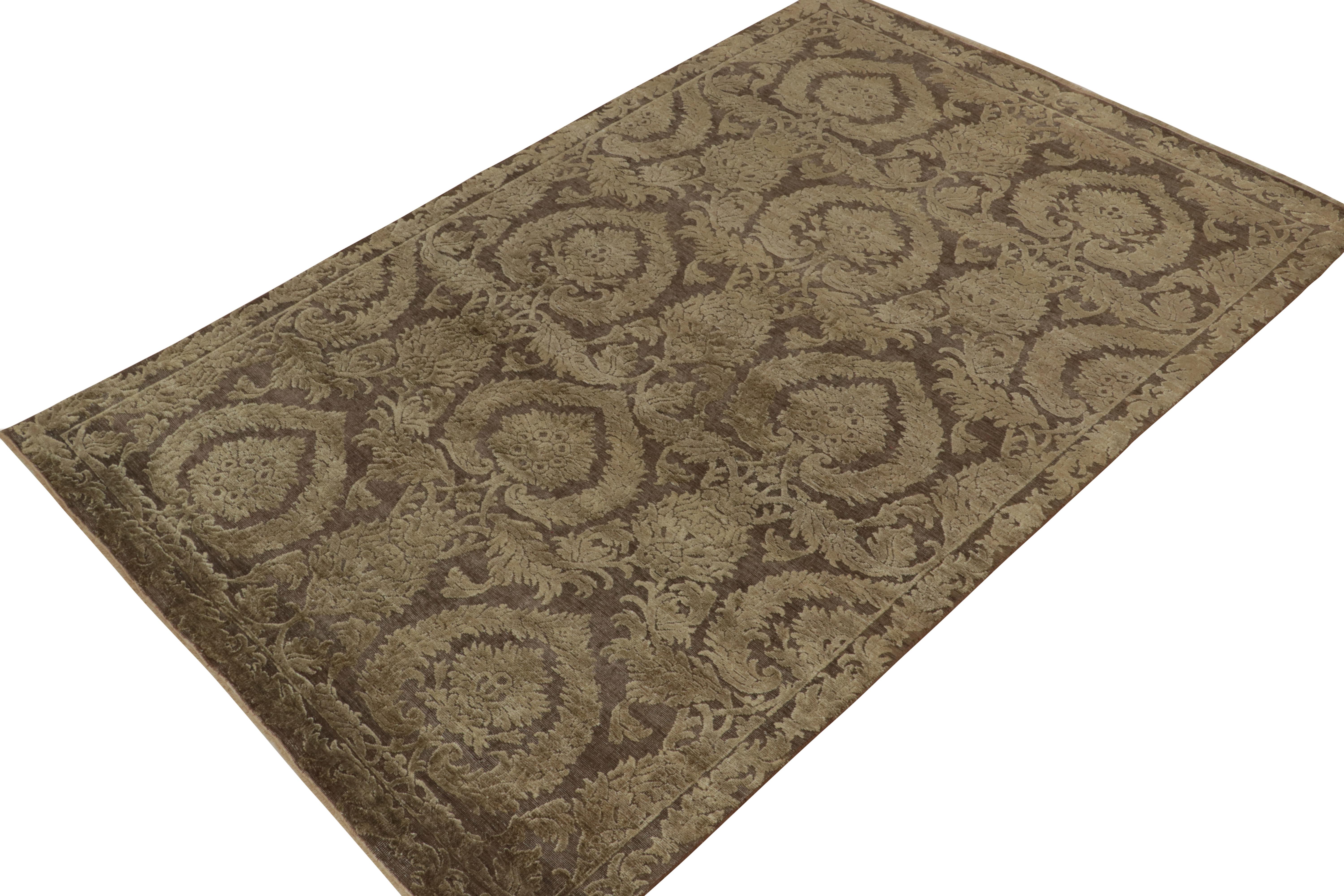 Handknotted in a luxurious blend of wool & silk, this 6x9 contemporary rug from our Modern Classics collection is particularly inspired by classic Italian art styles.

On the Design: An all over floral pattern in luscious beige-brown tones enjoys a