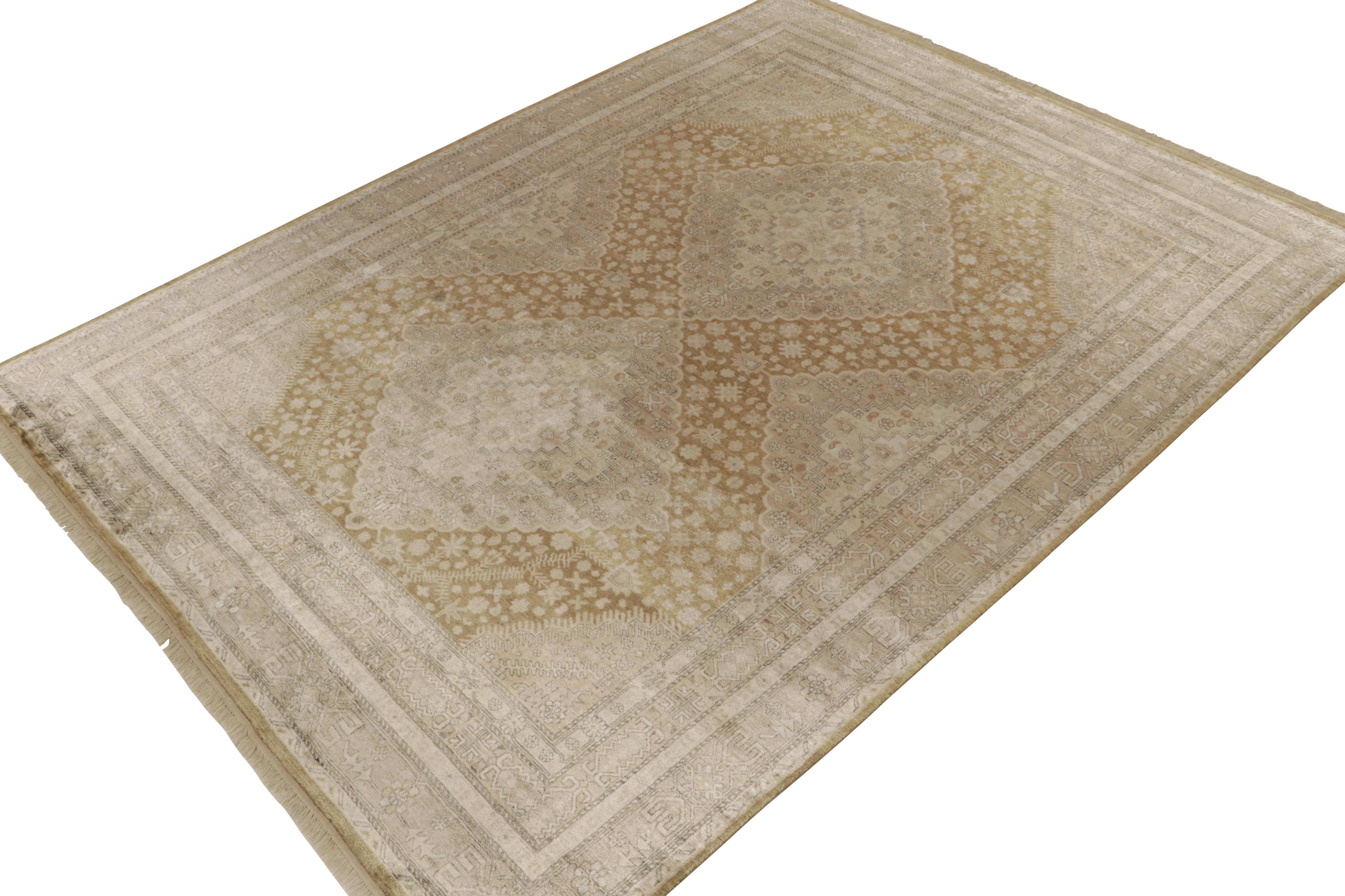 Hand-knotted in luxurious silk, this 9x12 contemporary rug from our Modern Classics collection marries a unique array of regal inspirations. Marrying Khotan and Moroccan sensibilities, the pattern harmonizes diamond and trellises with meticulous