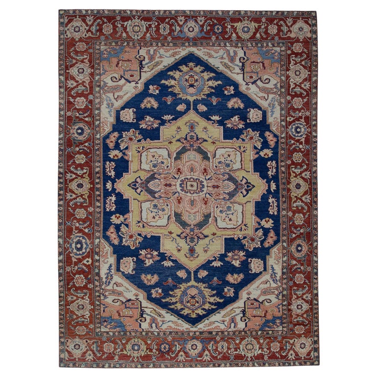 Rug and Kilim’s Classic Oushak Style Rug in Navy with Pink Medallion