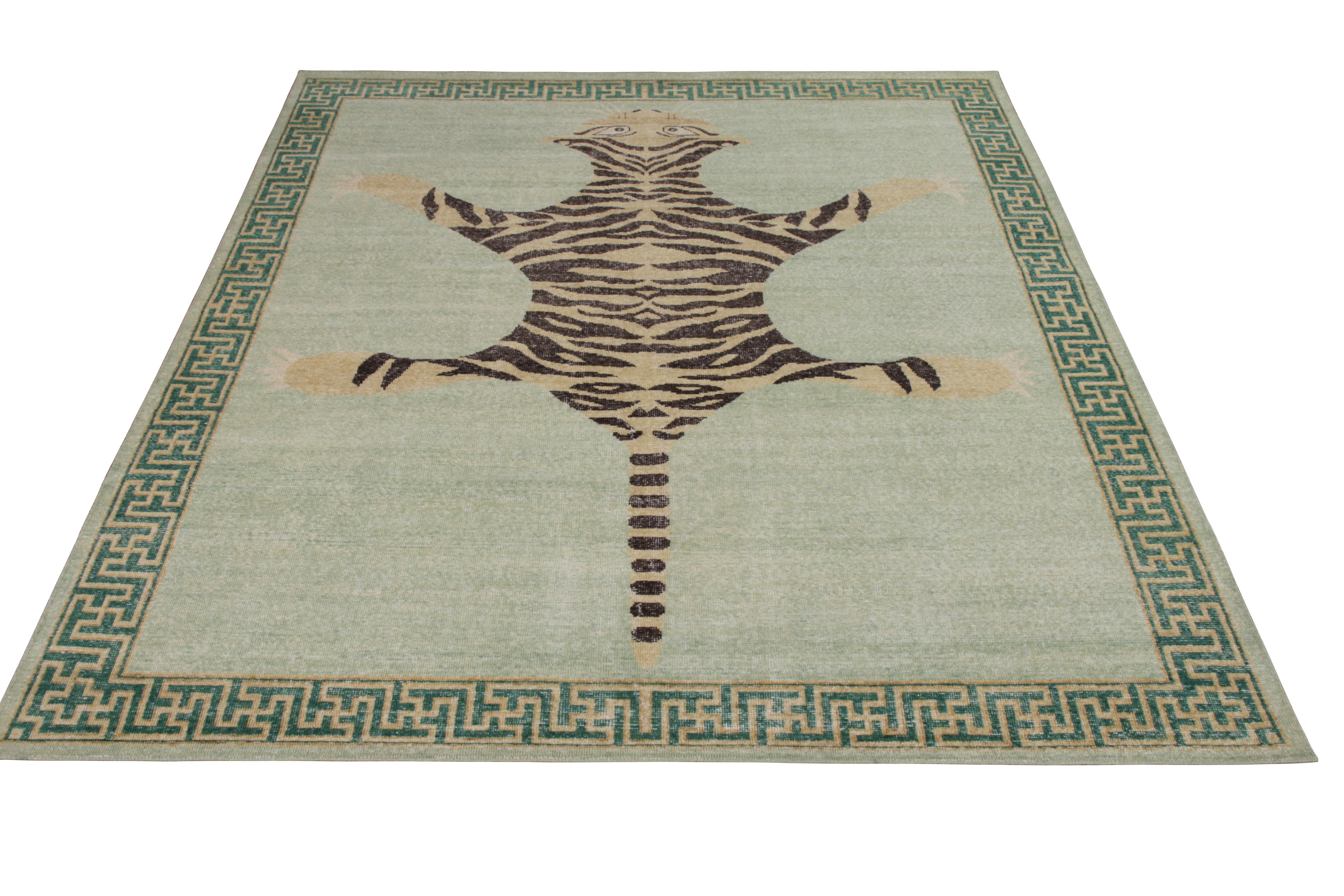 An 8 x 10 pictorial ode to the classic Indian tiger rug, joining the Homage Collection by Rug & Kilim. Hand knotted in wool, exemplifying this collection’s modern take on distressed style through a comfortable, easy-to-maintain wash. Playing beige