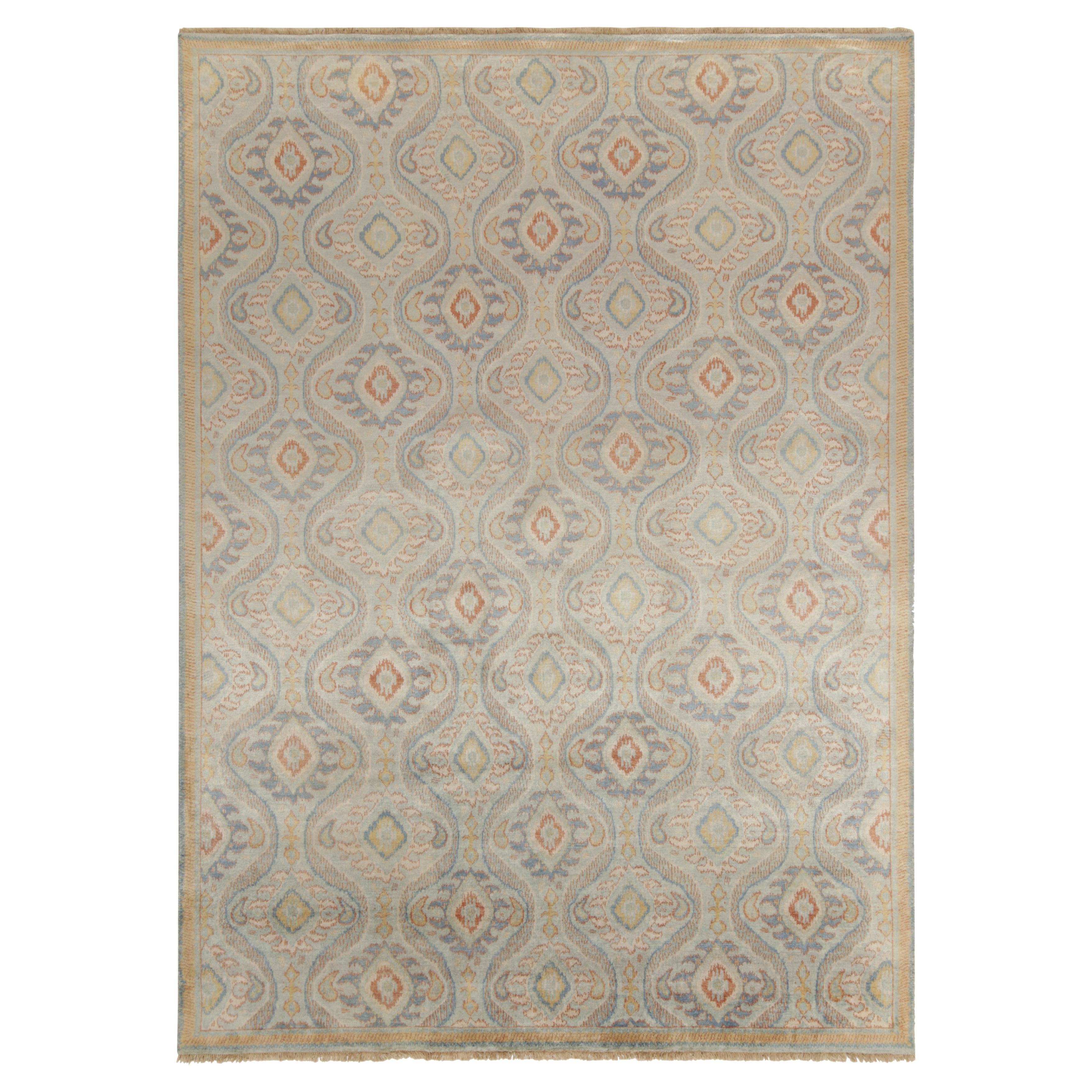 Alfombra de estilo clásico de Rug & Kilim con motivos ikats azules, rojos y dorados