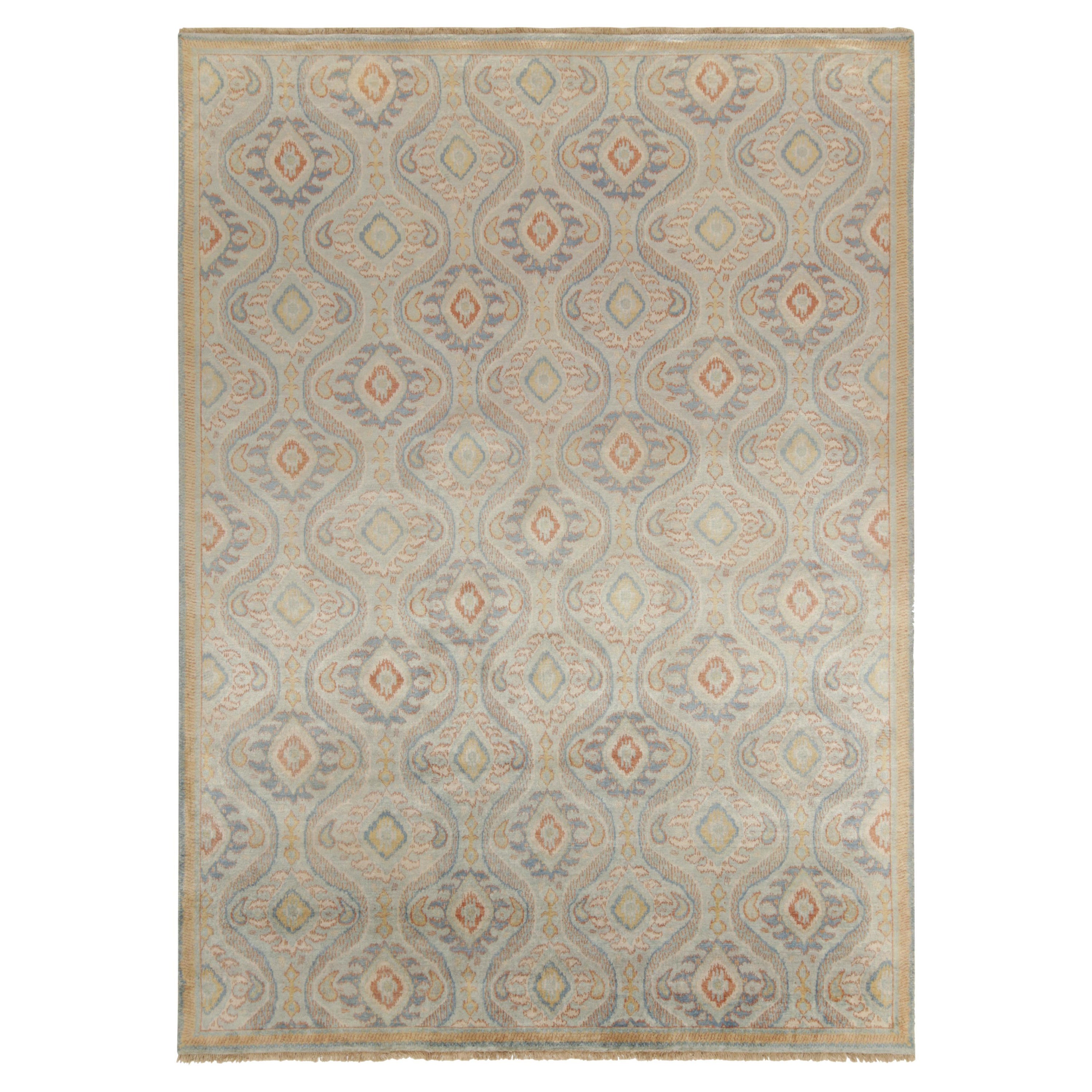 Alfombra de estilo clásico de Rug & Kilim con motivos ikats azules, rojos y dorados