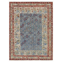 Rug & Kilim’s Classic-Style Rug in Blue with Colorful Floral Patterns