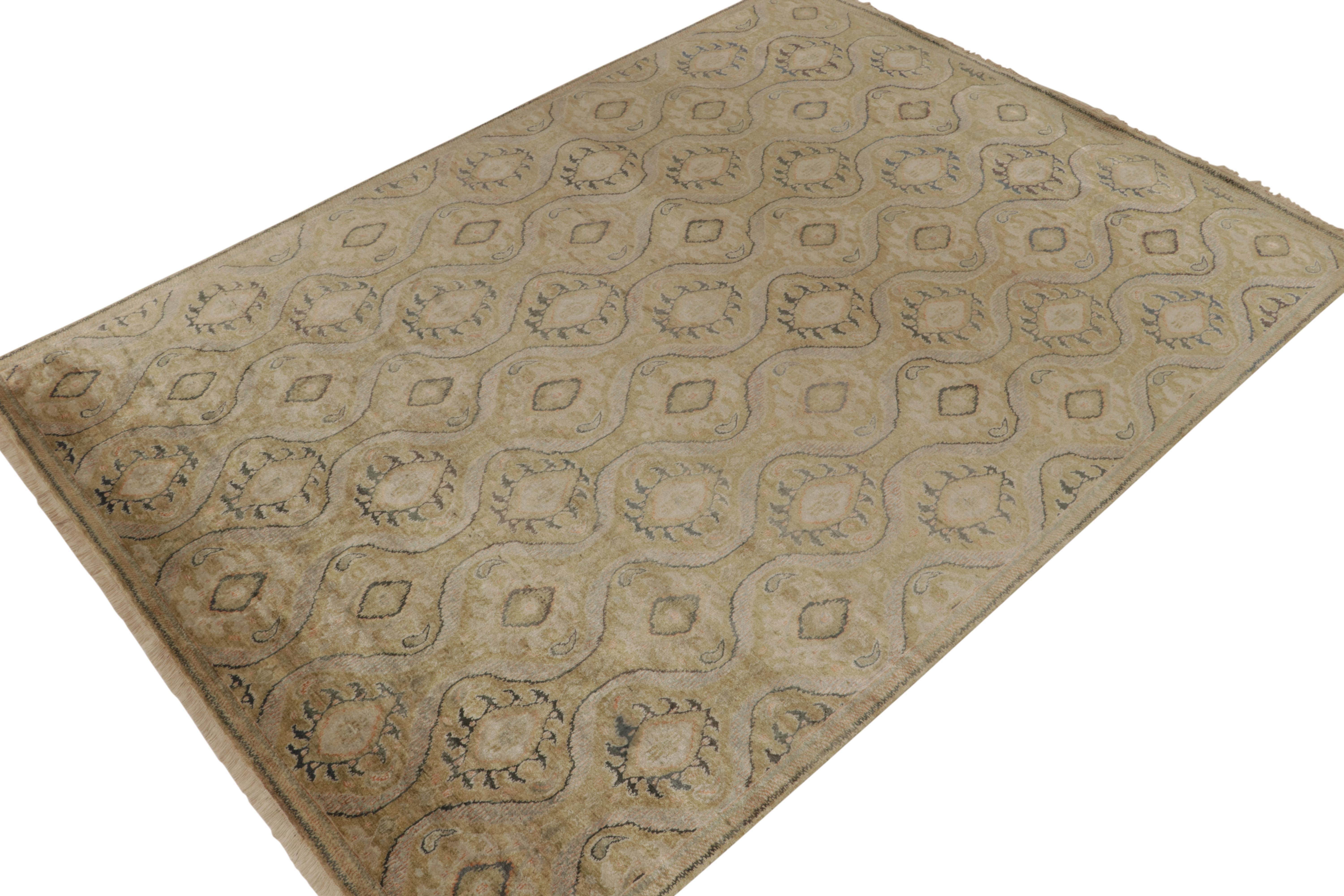 Hand-knotted in silk, this 9x12 rug from our Modern Classics collection is an inventive celebration of classic Ikats patterns.

On the Design: Curvaceous, finely detailed patterns enjoy a gorgeous golden-beige, with blue accents and a green