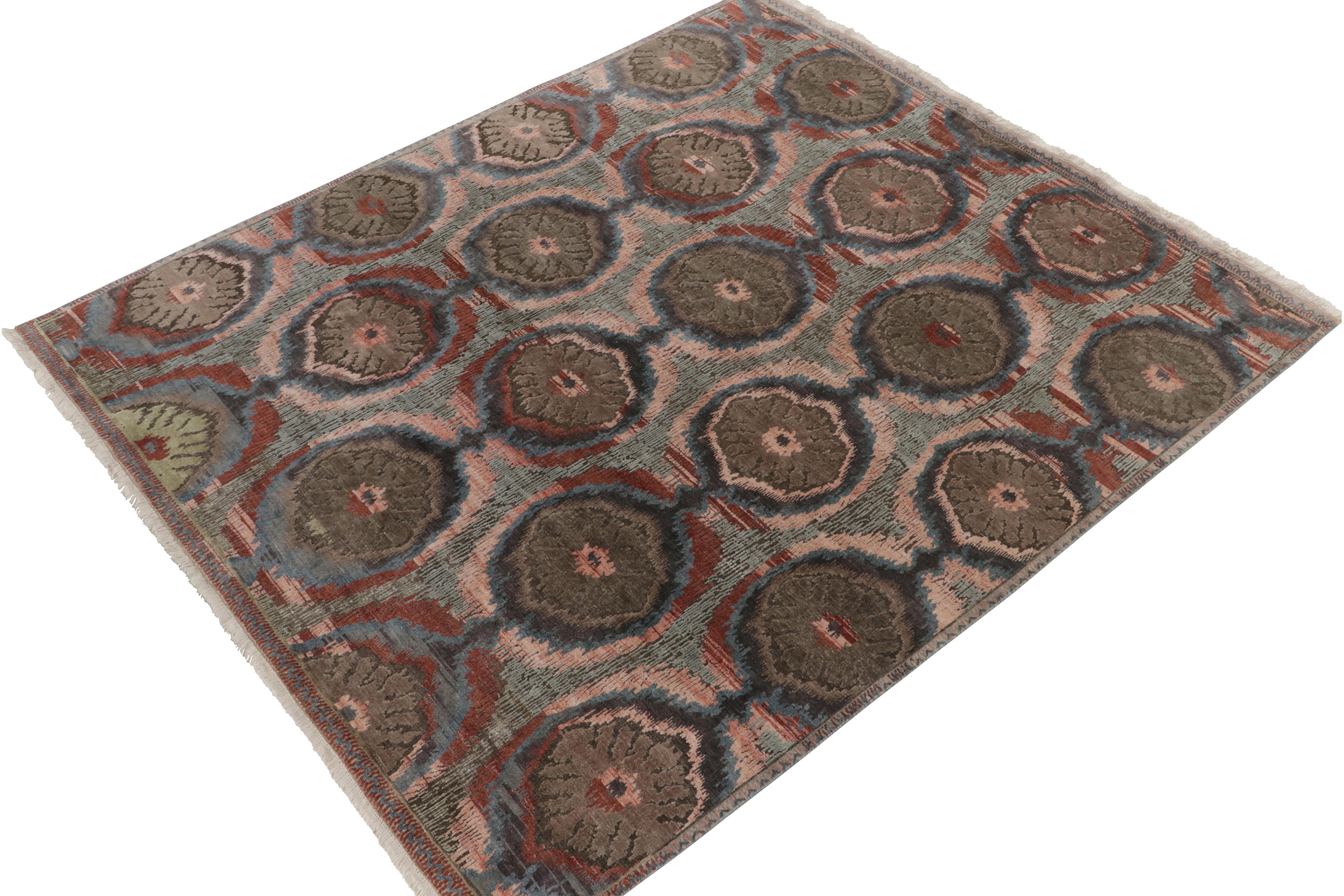Hand-knotted in luxurious wool & silk, this 8x10 contemporary rug from our Modern Classics collection recaptures classic Ikats patterns in an inventive fashion. 

On the Design: A gracious scale hosts the most modern play of reds, blues and pinks,