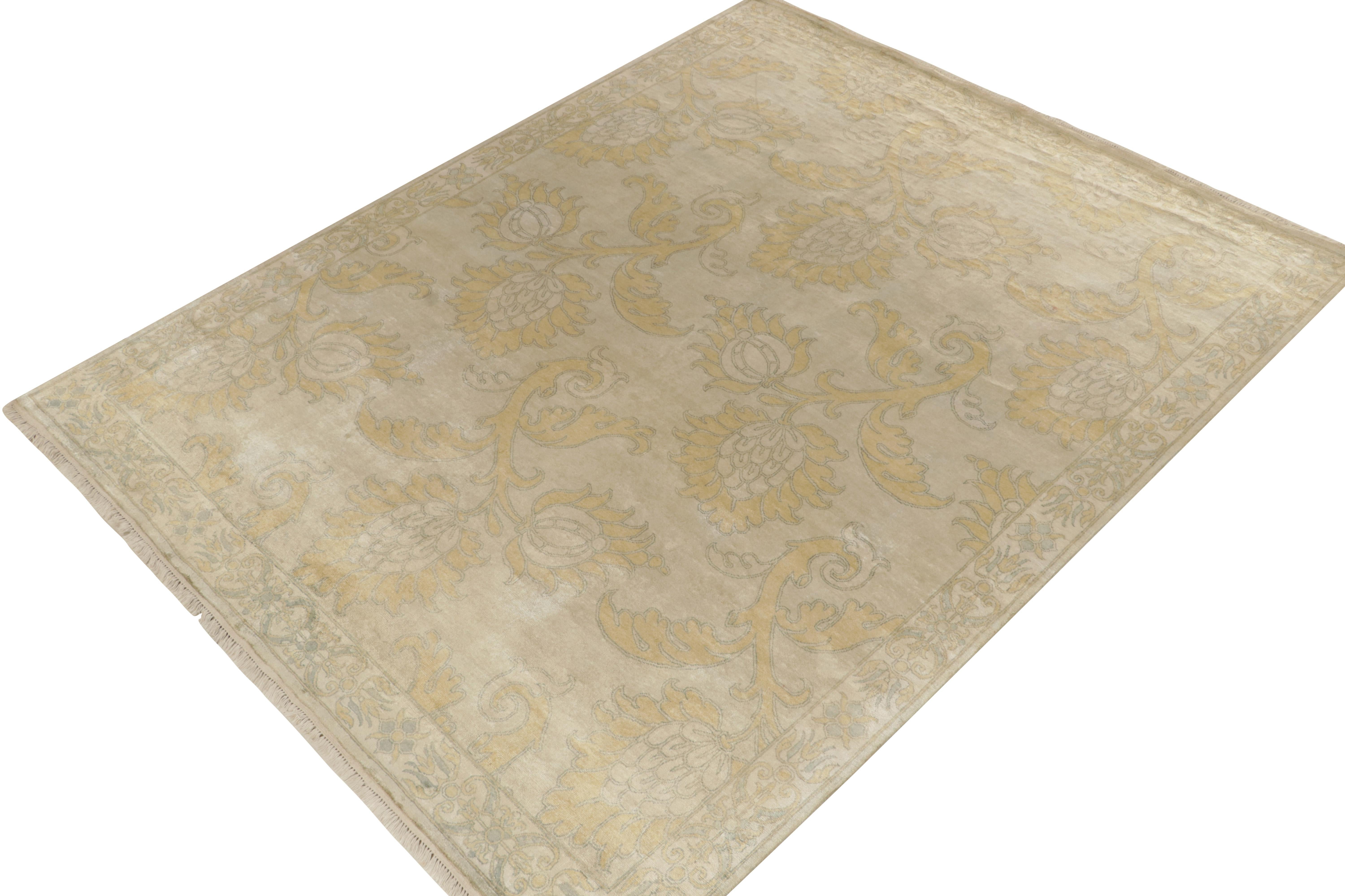 Hand-knotted in all silk, this 8x10 from our Modern Classics collection is an ode to rare European rug styles. 

On the Design: The drawing favors asymmetric floral patterns in forgiving tan with regal blue and gold hues in a graceful curvature.