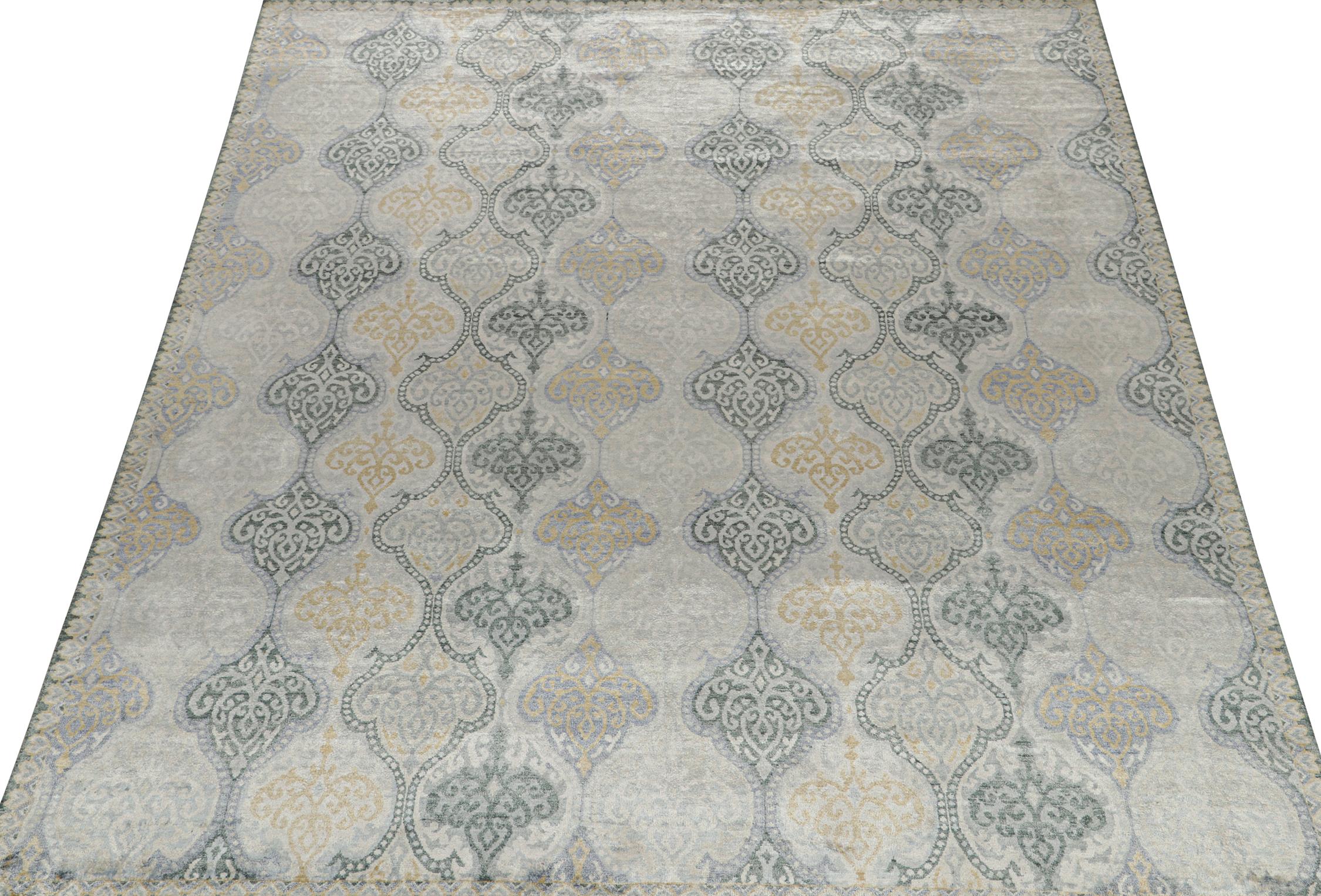 An 8x10 rug inspired from traditional rug styles, from Rug & Kilim’s Modern Classics Collection. Hand-knotted in wool, playing a confluence of gray, beige, blue and gold floral patterns with classic grace.
Further On the Design:
Keen eyes will