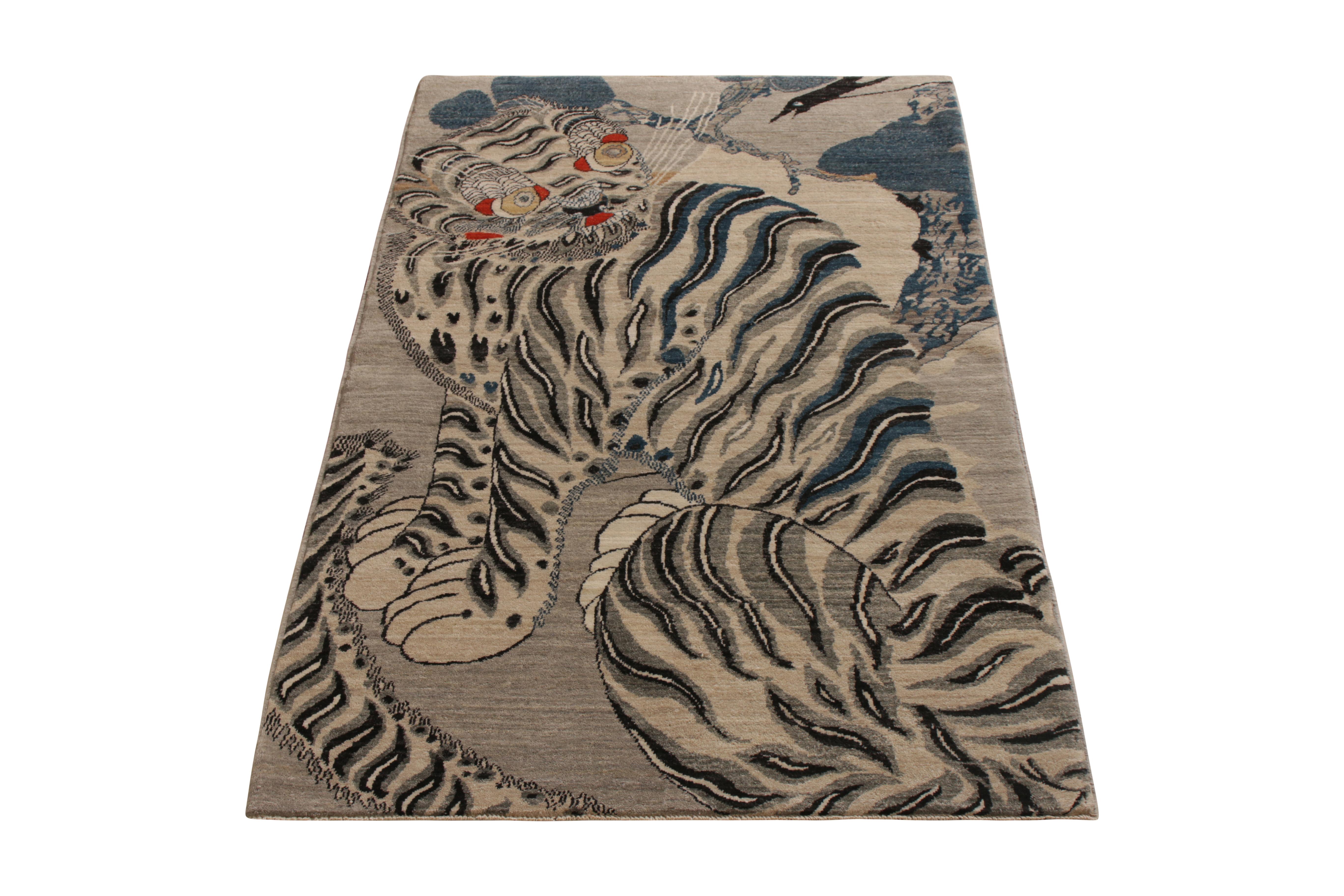A 3 x 5 ode to celebrated Tiger pictorial rug styles, from the titular new collection by Rug & Kilim. Hand knotted in wool, enjoying a bold white tiger take on positive-negative with white and black beside silver-gray and blue hues. Further sporting