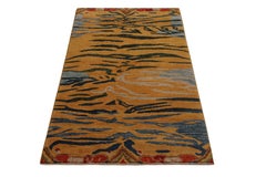 Rug & Kilim’s Classic Style Tiger Rug in Orange and Blue Abstract Stripe Pattern