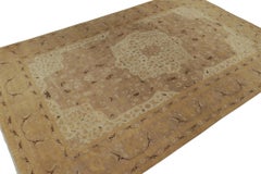 Rug & Kilim’s Classic Tabriz style rug in Beige-Brown and Gold Floral Patterns