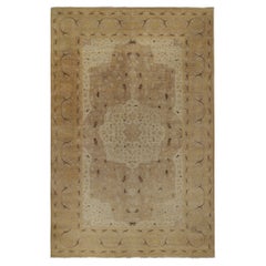 Rug & Kilim’s Classic Tabriz style rug in Beige-Brown and Gold Floral Patterns