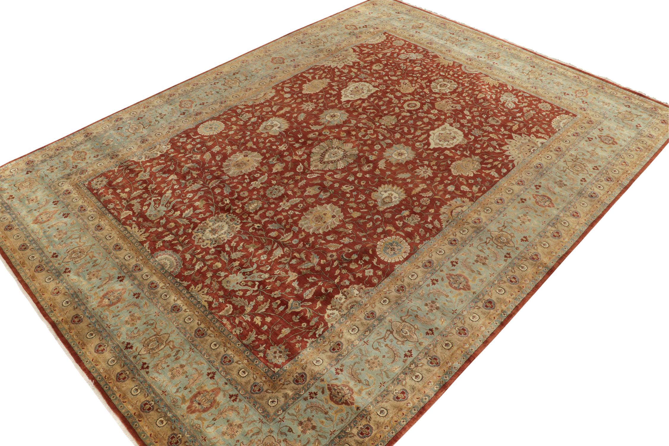 Hand-knotted in wool, this 12x16 contemporary rug from our Modern Classics collection uniquely reimagines antique Persian rug styles.

On the Design: A gracious scale depicts regal floral patterns in gentle beige and blue resting on rust red with
