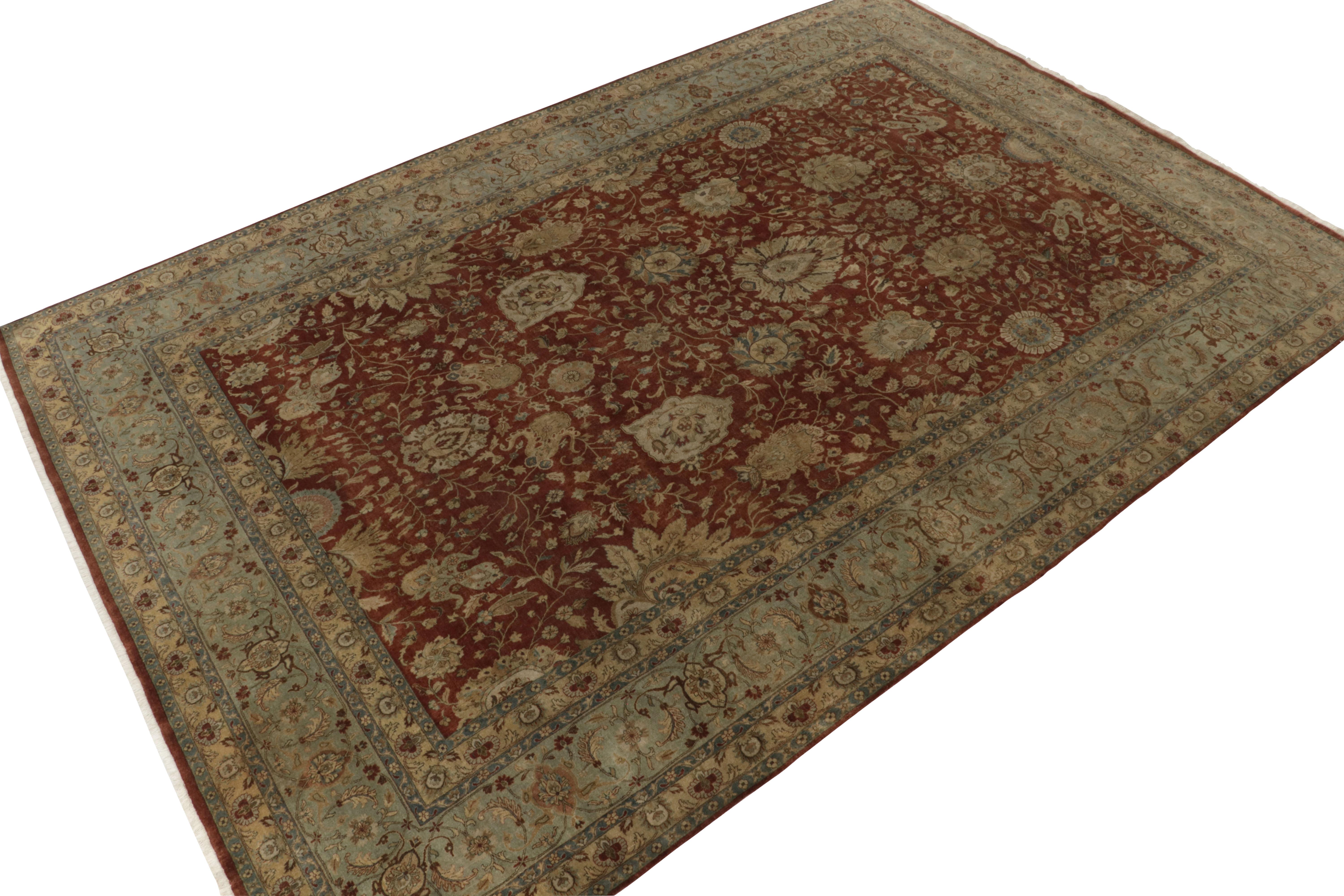 Handknotted in fine wool, this 10x15 contemporary rug from our Modern Classics collection is particularly inspired by antique Tabriz rugs. 

On the Design: The gracious scale depicts a regal all over floral pattern in gentle beige and blue resting
