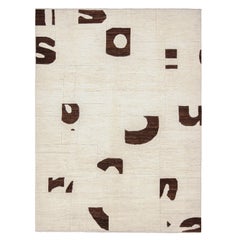 Tapis abstrait contemporain de Rug & Kilim en beige avec des motifs géométriques bruns