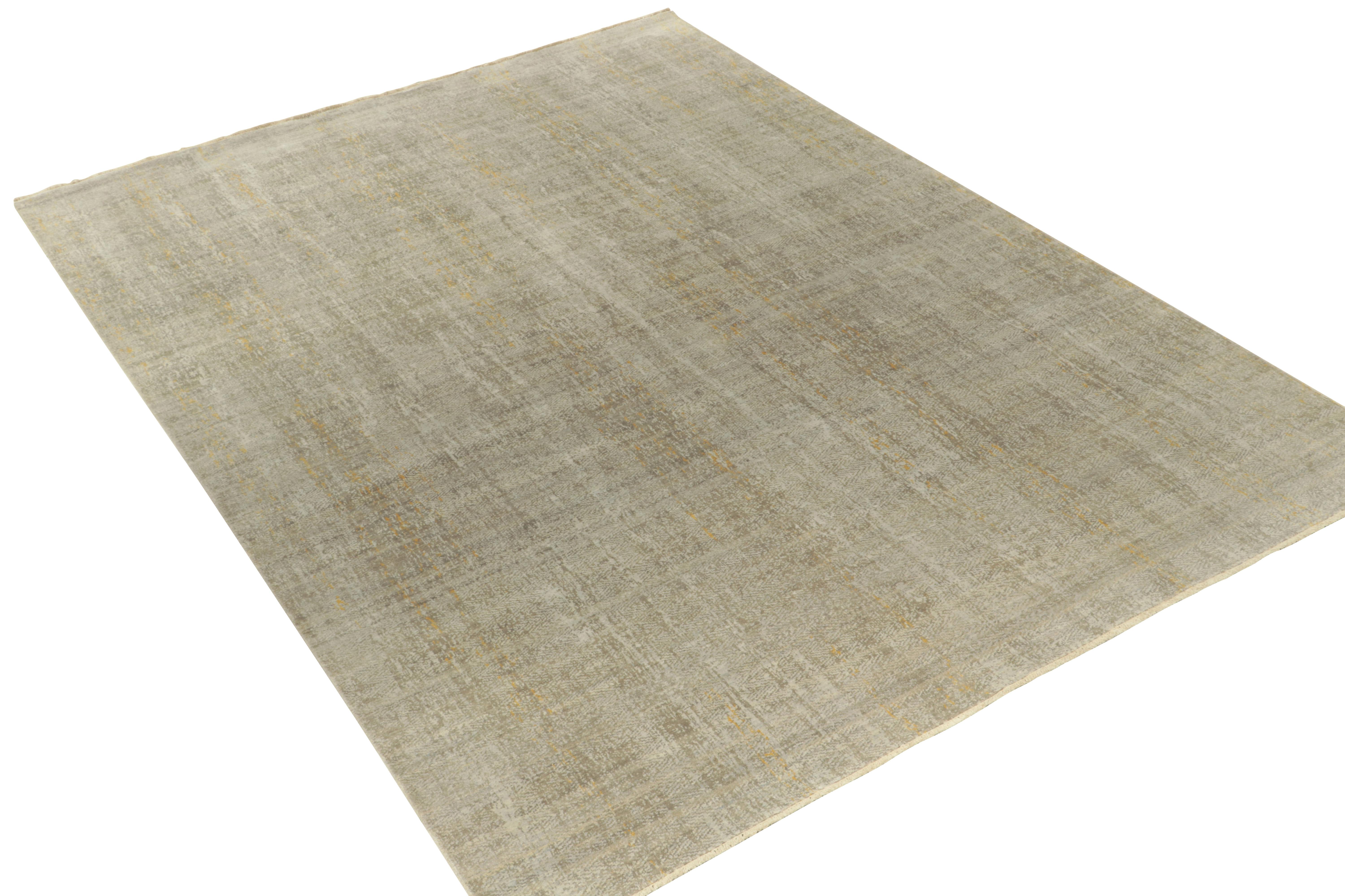 Hand-knotted in fine silk, a 9x12 abstract piece from Rug & Kilim’s contemporary designs. The bold modern vision enjoys silver gray & blue with subdued gold accents lending a fabulous dimensionality in the marriage of texture and overlapping