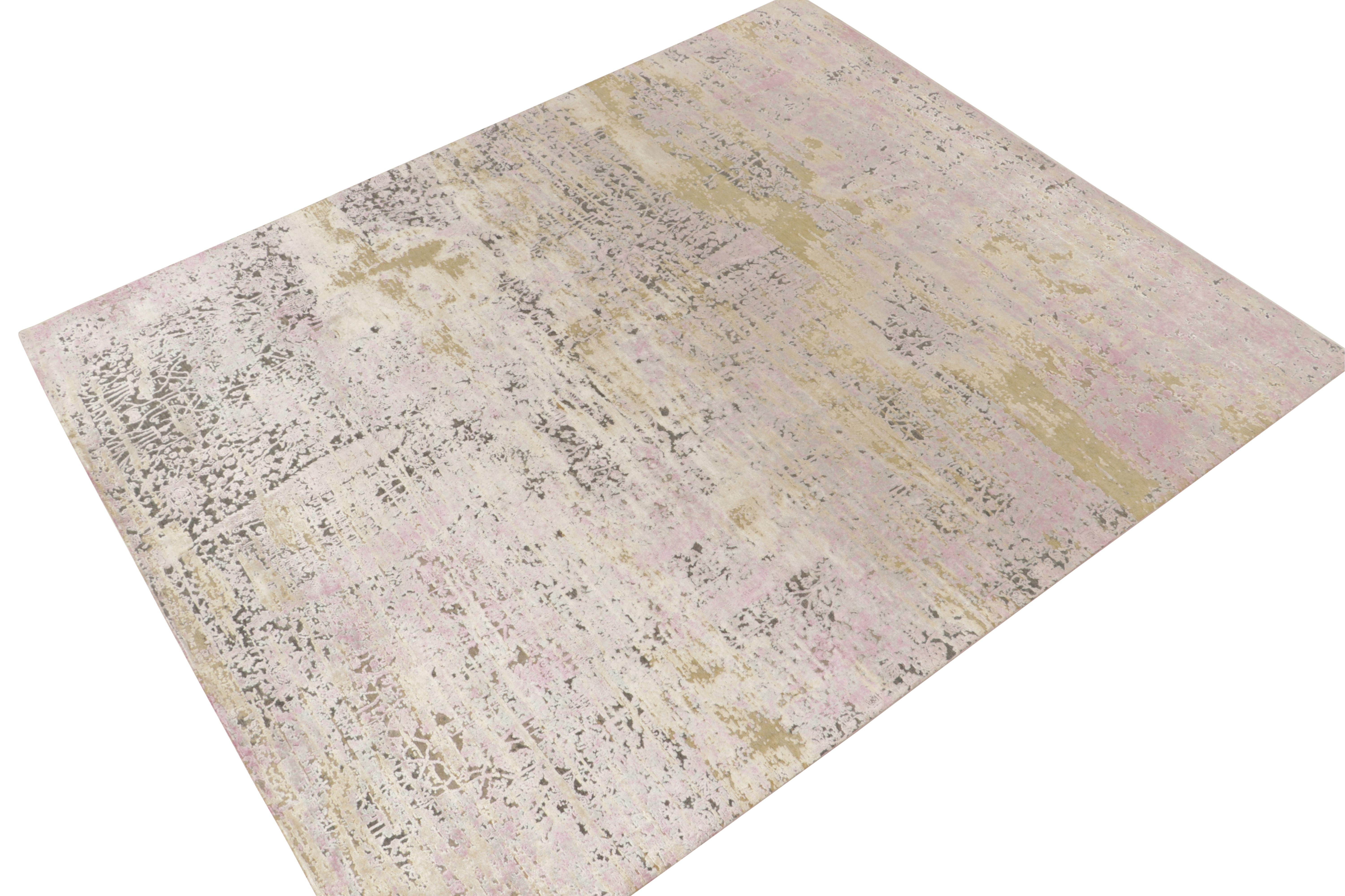 Hand-knotted in a fine blend of wool & silk, a fabulous 8x10 abstract rug from Rug & Kilim’s bold modern designs. 

The colorway enjoys a play of pink with beige-brown & silver-gray hues with a painterly attitude and elegant sheen from the