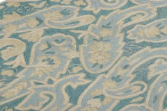 Rug & Kilim’s Contemporary Chain Stitch Rug in Blue with Cream Floral Patterns