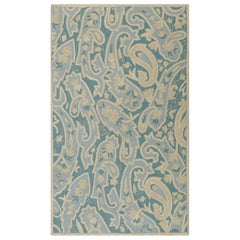 Rug & Kilim’s Contemporary Chain Stitch Rug in Blue with Cream Floral Patterns