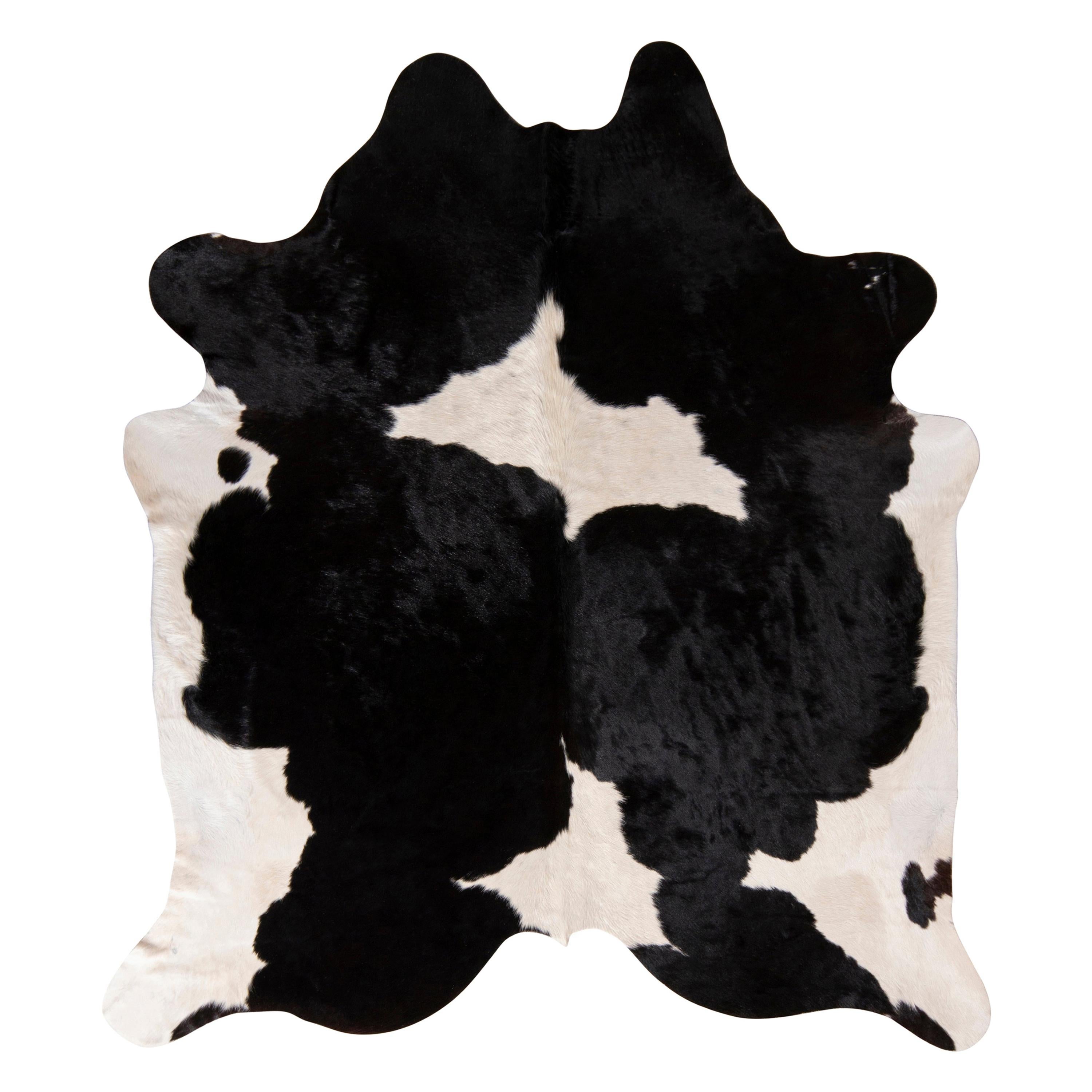 Rug & Kilim’s Contemporary Cowhide Rug in Black and White