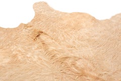 Rug & Kilim’s Contemporary Cowhide Rug in Cream