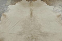 Rug & Kilim’s Contemporary Cowhide Rug in Soft Beige & Brown Tones