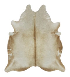 Rug & Kilim’s Contemporary Cowhide Rug in Warm Beige & Brown Accents