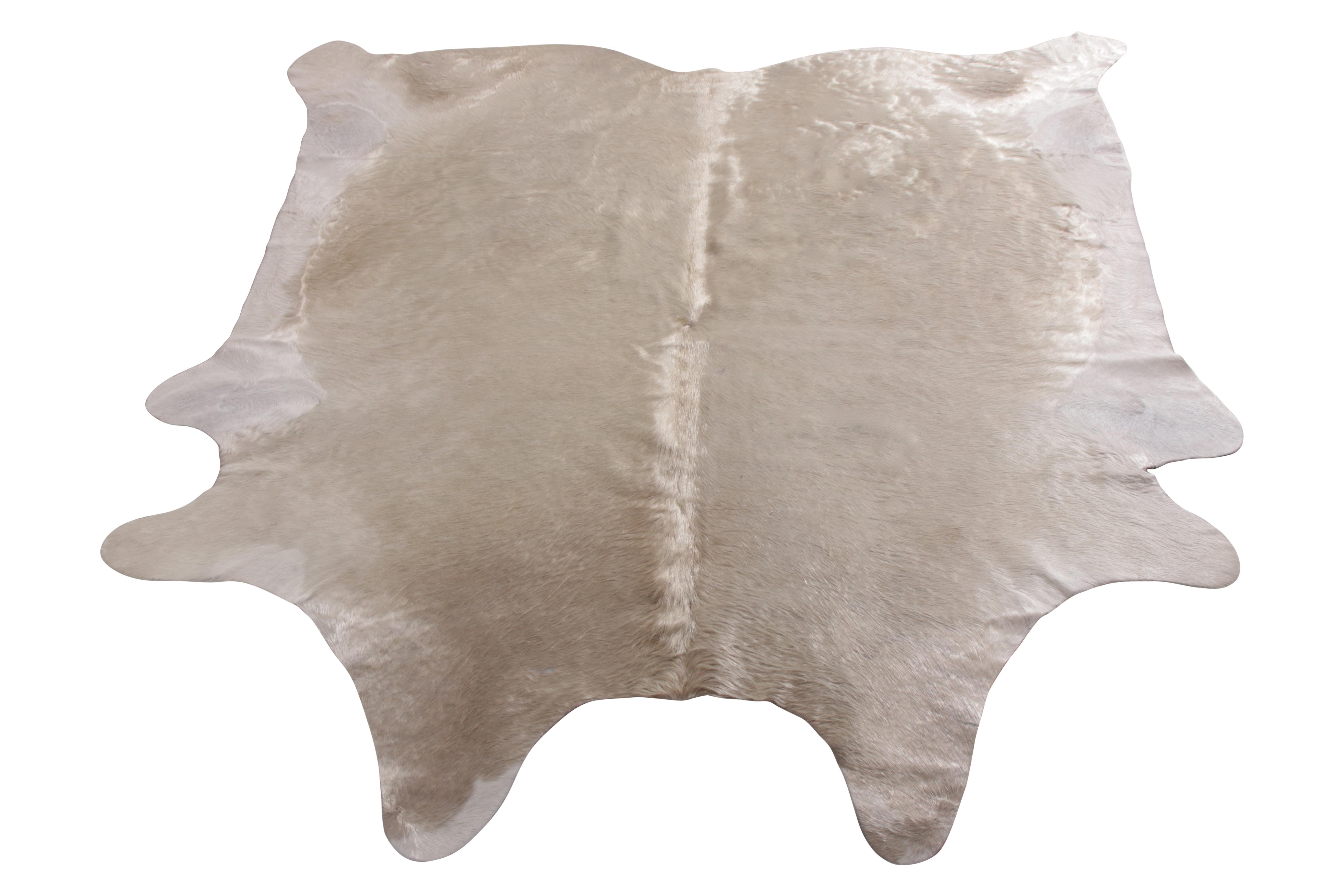 white and gold cowhide rug