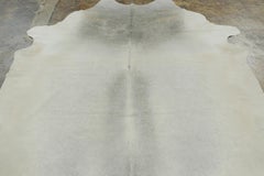 Rug & Kilim’s Contemporary Cowhide Rug with Ombre in Soft White & Gray Tones