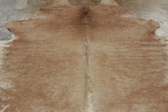 Rug & Kilim’s Contemporary Cowhide Rug with Striking Beige & Brown Patterns