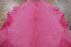 Rug & Kilim’s Contemporary Cowhide Solid Rug in Bright Pink Hues