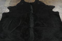 Rug & Kilim’s Contemporary Cowhide Solid Rug in Deep Black