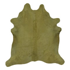 Rug & Kilim’s Contemporary Cowhide Solid Rug in Sage Green Hues