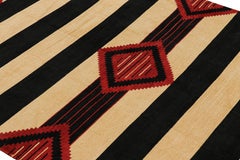 Rug & Kilim’s Contemporary Dhurrie Rug in Black and Red Medallions and Stripes