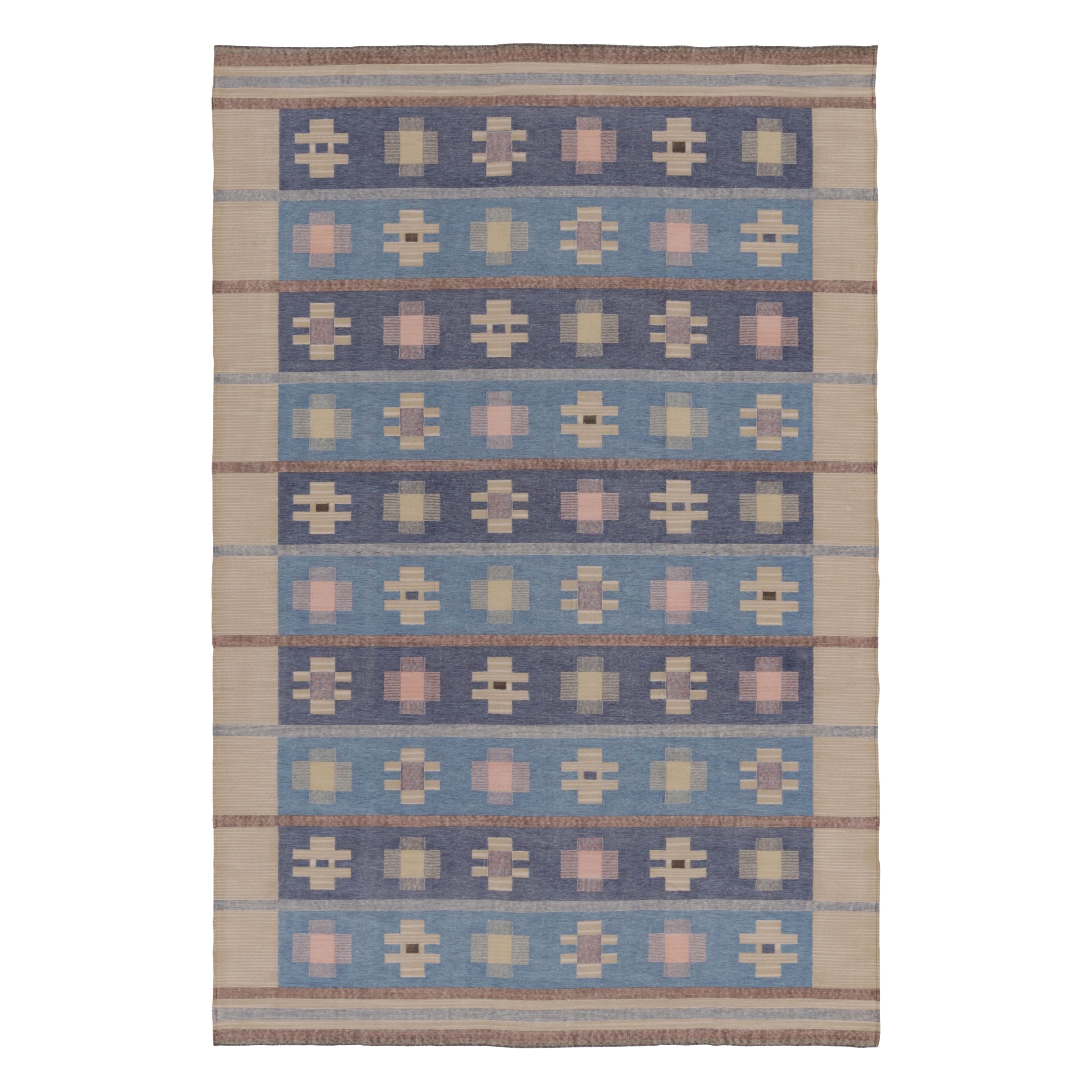 Rug & Kilim’s Contemporary Dhurrie Rug in Blue and Beige with Geometric Accents