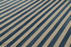 Rug & Kilim’s Contemporary Dhurrie Rug in Blue and Cream White Stripes