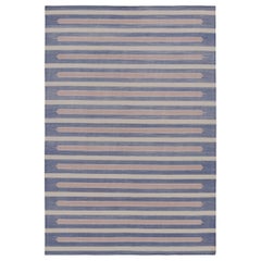 Rug & Kilim’s Contemporary Dhurrie Rug in Blue and Cream with Stripes