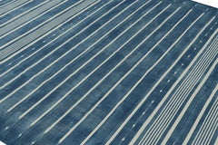 Rug & Kilim’s Contemporary Dhurrie Rug in Blue and Off-White Stripes