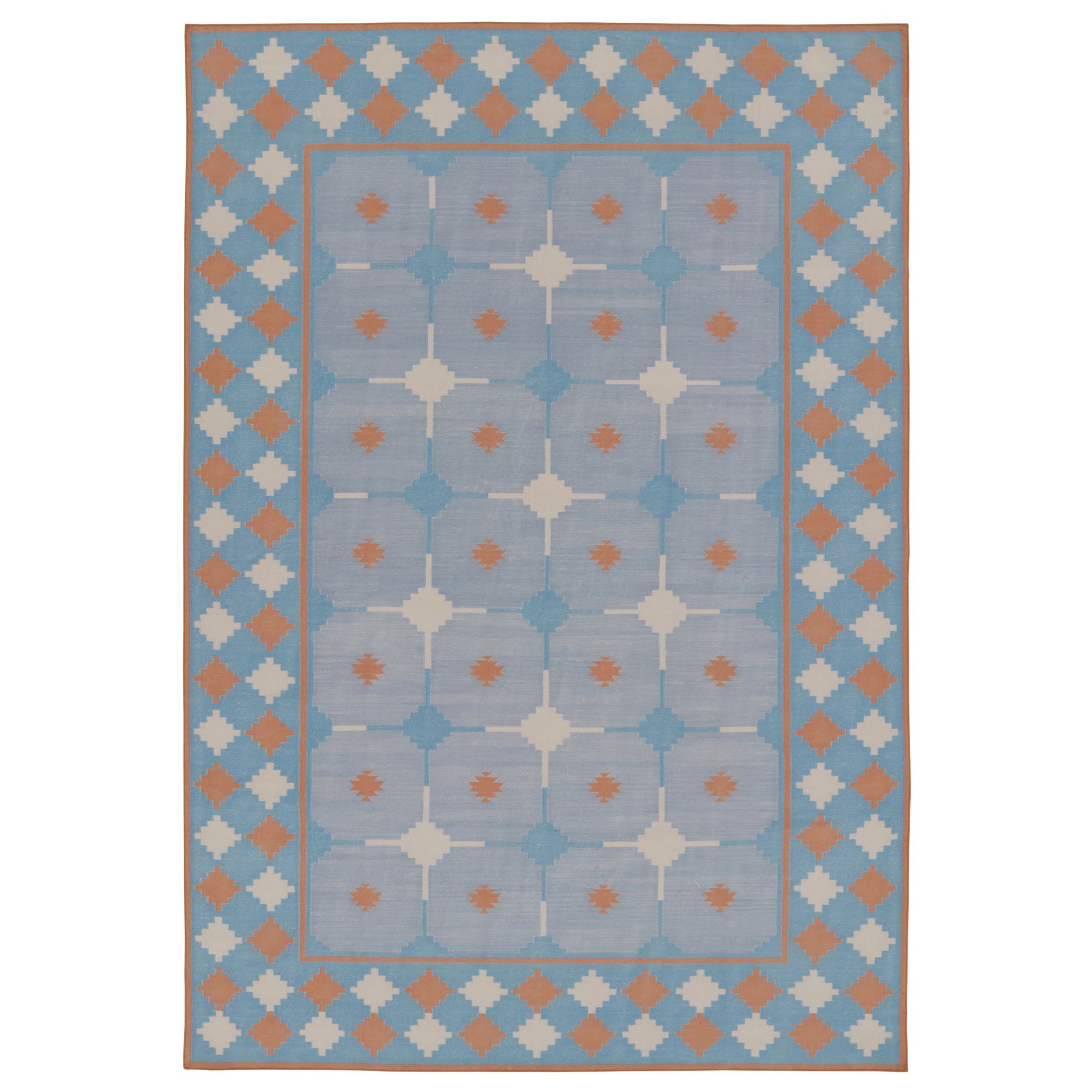 Rug & Kilim’s Contemporary Dhurrie Rug in Blue and Rust Tile Design