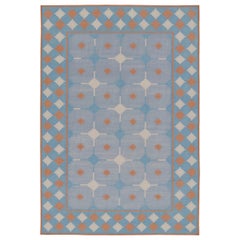 Rug & Kilim’s Contemporary Dhurrie Rug in Blue and Rust Tile Design