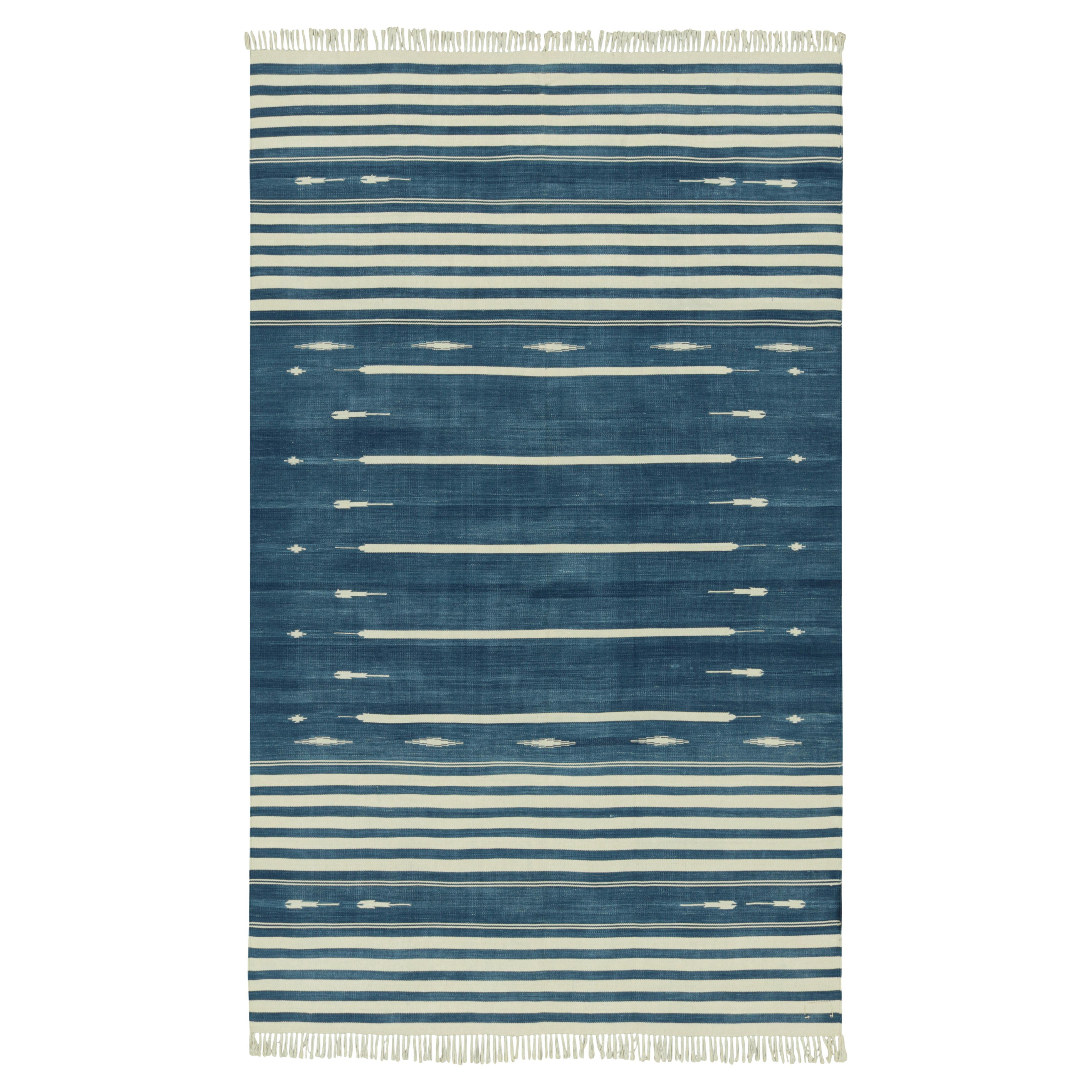 Rug & Kilim’s Contemporary Dhurrie Rug in Blue and White Stripes