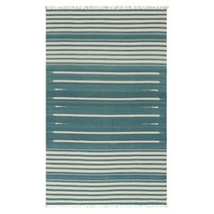 Rug & Kilim’s Contemporary Dhurrie Rug in Blue and White Stripes