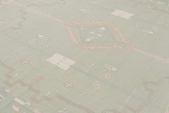 Rug & Kilim’s Contemporary Dhurrie Rug in Bright Green with Geometric Patterns